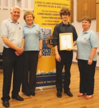 Daniel Bovey pictured with GMS Lions Club members